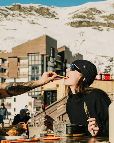 Après-ski dining on the sunny terrace of Le Val Thorens, a Beaumier hotel
