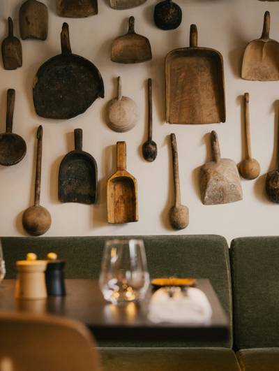 Rustic decor and vintage utensils at Le Bistrot de L'Alpaga, Beaumier restaurant in Megève