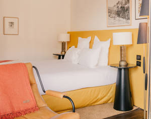 Aménagement du lit double confortable en chambre Privilège.