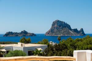 A wonderful photo clicked from the resort room captures two island mountains in the ocean.