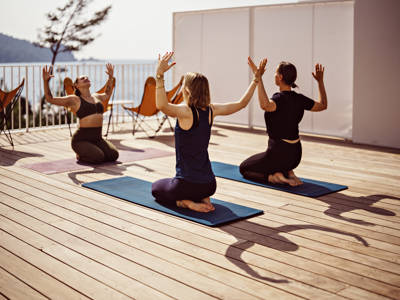 Outdoor yoga session by the sea at the Beaumier hotel Les Roches Rouges, Saint-Raphaël