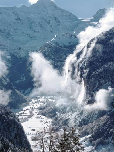 Lauterbrunnen valley and frozen waterfalls in winter, view from the Beaumier Grand Hotel Belvedere in Wengen